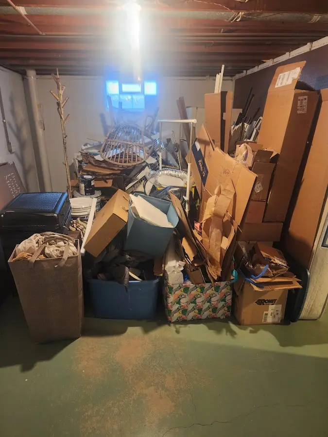 Roll-off dumpster container at job site for 2 Yard Dumpster Rental in Canby